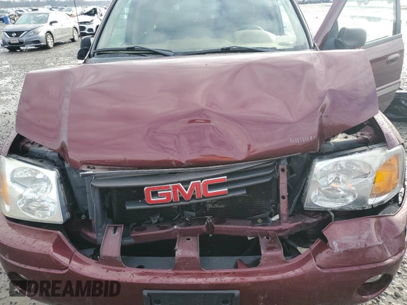 2003 GMC Envoy SLT with VIN 1GKDT13S032245485, listed as a Copart auction lot 84385304 with 139,183 mi miles and Salvage Title. Bid and sale history available at carsss.com. Image 14.