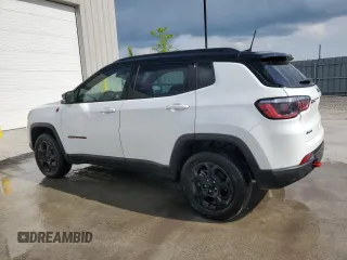 2023 Jeep Compass Trailhawk with VIN 3C4NJDDN5PT567737, listed as a Copart auction lot 61824665 with 43,843 mi miles and Clean title. Bid and sale history available at DreamBid. Image 2.