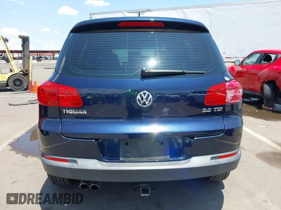 2013 Volkswagen Tiguan with VIN WVGCV3AX6DW605876, listed as a IAAI auction lot 42431619 with 106,279 mi miles and . Bid and sale history available at DreamBid. Image 16.