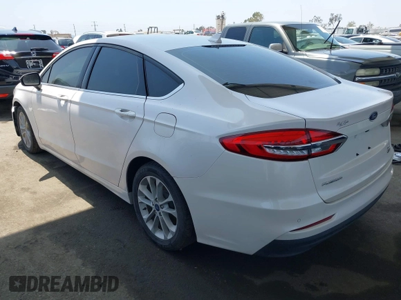 2020 Ford Fusion SE with VIN 3FA6P0LU9LR227928, listed as a IAAI auction lot 42445186 with 59,431 mi miles and . Bid and sale history available at DreamBid. Image 3.