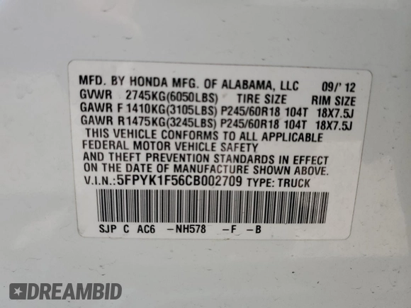 2012 Honda Ridgeline RTL with VIN 5FPYK1F56CB002709, listed as a Copart auction lot 62642495 with 116,416 mi miles and Salvage title. Bid and sale history available at DreamBid. Image 12.