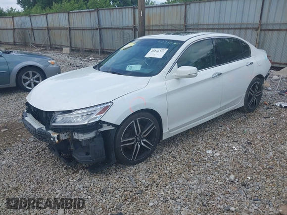 2017 Honda Accord Touring with VIN 1HGCR3F98HA003410, listed as a IAAI auction lot 42534659 with 211,470 mi miles and . Bid and sale history available at DreamBid. Image 2.