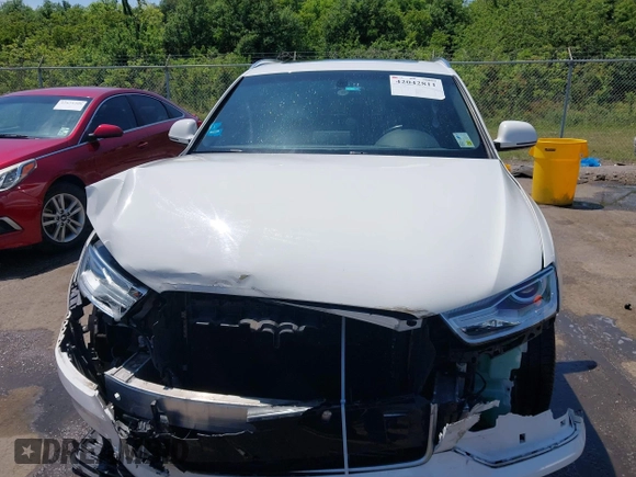 2018 Audi Q3 Premium with VIN WA1BCCFS4JR000455, listed as a IAAI auction lot 42042811 with 57,354 mi miles. Bid and sale history available at carsss.com. Image 12.