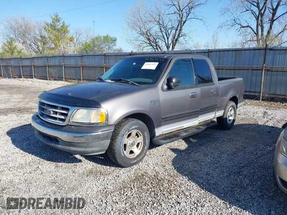 2003 Ford F-150 XLT with VIN 1FTRW07L13KB66977, listed as a IAAI auction lot 41967541 with 124,714 mi miles. Bid and sale history available at carsss.com. Image 2.
