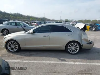 2013 Cadillac ATS Premium z VIN 1G6AE5S33D0101388, wystawiony jako IAAI lot #41921020 z przebiegiem 160 616 mil mil oraz . Historia ofert i sprzedaży dostępna na DreamBid. Obrazek 14.