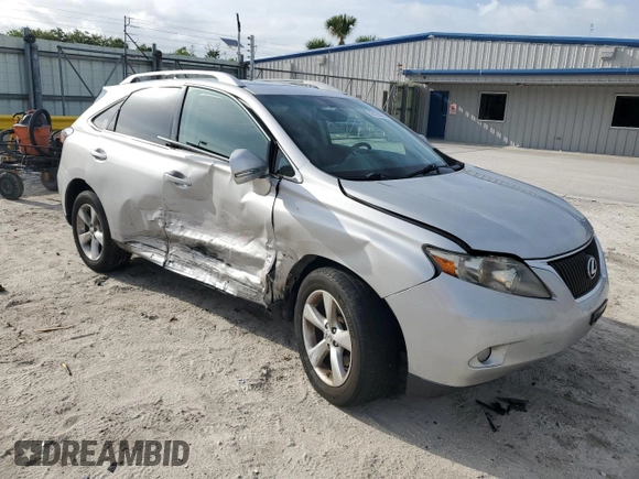 2010 Lexus RX 350 with VIN 2T2BK1BA7AC001406, listed as a Copart auction lot 63128955 with 220,634 mi miles and Salvage title. Bid and sale history available at DreamBid. Image 4.