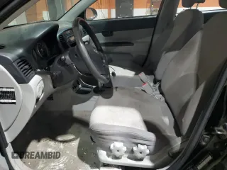 2007 Hyundai Accent GL z VIN KMHCN45C87U142295, wystawiony jako Copart lot #86149894 z przebiegiem 325 738 mil mil oraz Szkoda całkowita • Salvage title. Historia ofert i sprzedaży dostępna na DreamBid. Obrazek 7.