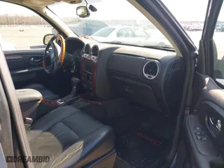 2007 GMC Envoy Denali with VIN 1GKET63M672231311, listed as a IAAI auction lot 41992787 with 212,145 mi miles. Bid and sale history available at carsss.com. Image 5.