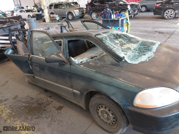 1996 Honda Civic DX with VIN 1HGEJ6625TL019386, listed as a IAAI auction lot 40775179 with 212,267 mi miles. Bid and sale history available at carsss.com. Image 14.