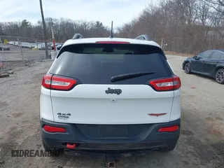2014 Jeep Cherokee Trailhawk with VIN 1C4PJMBS5EW240375, listed as a IAAI auction lot 41806725 with 127,705 mi miles. Bid and sale history available at carsss.com. Image 16.