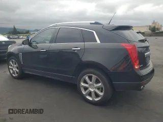 2013 Cadillac SRX Performance Collection with VIN 3GYFNDE33DS555717, listed as a Copart auction lot 53308195 with 125,528 mi miles and Salvage Title. Bid and sale history available at carsss.com. Image 2.