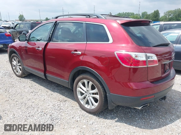 2011 Mazda CX-9 Grand Touring with VIN JM3TB3DA5B0316595, listed as a IAAI auction lot 42849889 with 232,619 mi miles and . Bid and sale history available at DreamBid. Image 3.