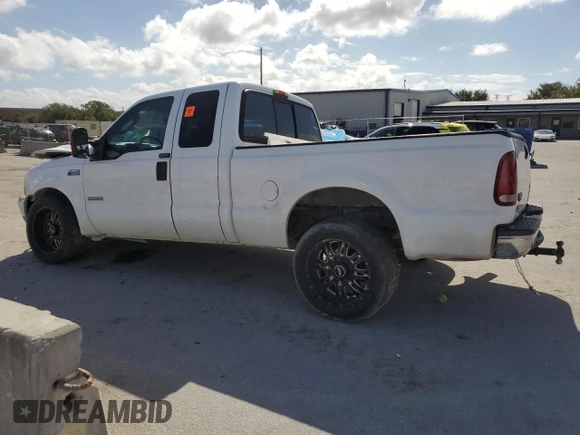 2004 Ford F-250 XL with VIN 1FTNX20PX4EA22882, listed as a Copart auction lot 79014334 with 262,447 mi miles and Salvage title. Bid and sale history available at DreamBid. Image 2.