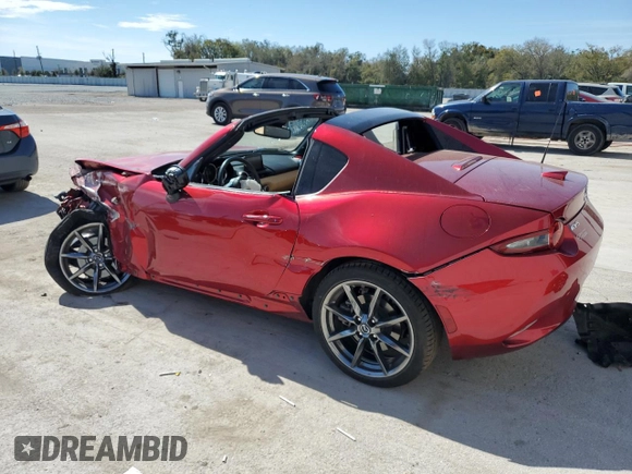 2020 Mazda MX-5 Miata Grand Touring z VIN JM1NDAM73L0412151, wystawiony jako Copart lot #47370245 z przebiegiem Nie podano mil oraz Nie do naprawy • Non repairable. Historia ofert i sprzedaży dostępna na DreamBid. Obrazek 2.