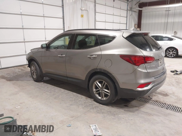 2017 Hyundai Santa Fe 2.4L z VIN 5XYZUDLBXHG447389, wystawiony jako IAAI lot #42249551 z przebiegiem 178 084 mil mil oraz . Historia ofert i sprzedaży dostępna na DreamBid. Obrazek 3.