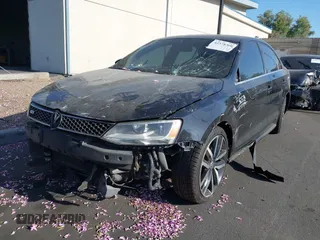2013 Volkswagen Jetta GLI Autobahn z VIN 3VW4A7AJ9DM381412, wystawiony jako IAAI lot #42378360 z przebiegiem 125 910 mil mil oraz . Historia ofert i sprzedaży dostępna na DreamBid. Obrazek 2.