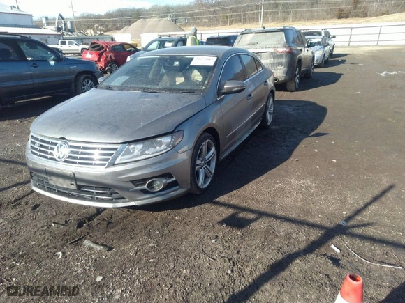 2013 Volkswagen CC Sport with VIN WVWBN7AN1DE563404, listed as a IAAI auction lot 41659845 with 171,631 mi miles. Bid and sale history available at carsss.com. Image 2.