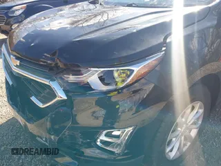 2021 Chevrolet Equinox LT z VIN 2GNAXKEV8M6126322, wystawiony jako IAAI lot #41879017 z przebiegiem 116 489 mil mil oraz . Historia ofert i sprzedaży dostępna na DreamBid. Obrazek 17.