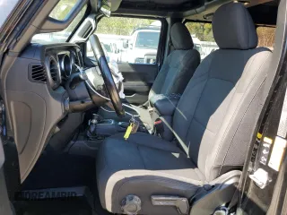 2022 Jeep Wrangler Unlimited Sport S with VIN 1C4HJXDG8NW130208, listed as a Copart auction lot 52572095 with 111,128 mi miles and Salvage Title. Bid and sale history available at DreamBid. Image 7.