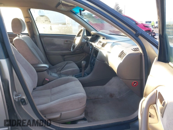 1997 Toyota Camry LE z VIN 4T1BG22K0VU019383, wystawiony jako IAAI lot #41271457 z przebiegiem 175 214 mil mil oraz . Historia ofert i sprzedaży dostępna na DreamBid. Obrazek 5.