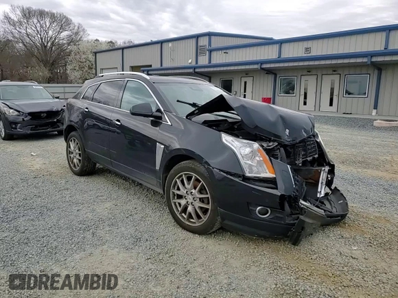 2014 Cadillac SRX Premium Collection z VIN 3GYFNGE3XES577569, wystawiony jako Copart lot #48399735 z przebiegiem Nie podano mil oraz Szkoda całkowita • Salvage title. Historia ofert i sprzedaży dostępna na DreamBid. Obrazek 11.