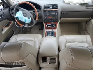 2000 Lexus LS 400 z VIN JT8BH28F5Y0167311, wystawiony jako Copart lot #85577644 z przebiegiem 194 390 mil mil oraz Szkoda całkowita • Salvage title. Historia ofert i sprzedaży dostępna na DreamBid. Obrazek 8.