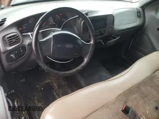 2002 Ford F-150 XL with VIN 1FTRF17W32KB68406, listed as a Copart auction lot 86059454 with 322,076 mi miles and Salvage Title. Bid and sale history available at carsss.com. Image 8.