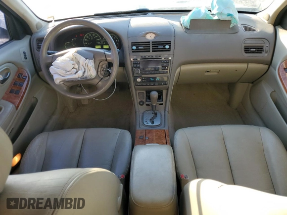 2002 Infiniti I35 Luxury with VIN JNKDA31A62T014458, listed as a Copart auction lot 77677764 with 169,007 mi miles and Salvage Title. Bid and sale history available at DreamBid. Image 8.