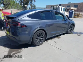 2022 Tesla Model X with VIN 7SAXCAE59NF360301, listed as a IAAI auction lot 41945059 with Not Provided miles and . Bid and sale history available at DreamBid. Image 4.