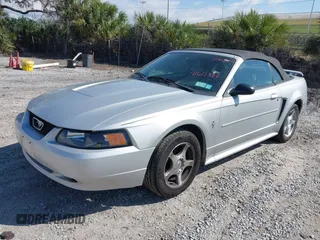 2003 Ford Mustang Deluxe z VIN 1FAFP44453F379157, wystawiony jako IAAI lot #41612382 z przebiegiem 107 599 mil mil oraz . Historia ofert i sprzedaży dostępna na DreamBid. Obrazek 2.