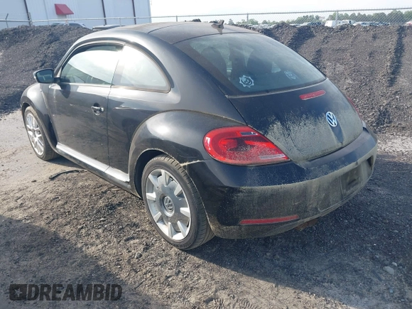 2013 Volkswagen Beetle 2.5L with VIN 3VWJP7AT1DM608370, listed as a IAAI auction lot 42088900 with Not Provided miles and . Bid and sale history available at DreamBid. Image 3.