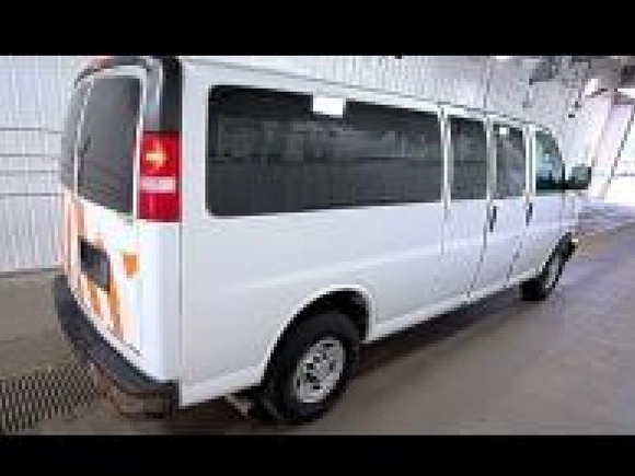 2012 Chevrolet Express Passenger 1LS with VIN 1GAZGZFA6C1126135, listed as a IAAI auction lot 42674342 with 229,560 mi miles and . Bid and sale history available at DreamBid. Image 2.