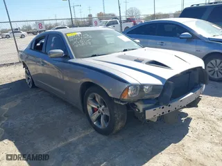2014 Dodge Charger RT with VIN 2C3CDXCT6EH185839, listed as a IAAI auction lot 41755632 with 128,716 mi miles. Bid and sale history available at carsss.com. Image 1.