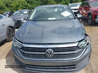 2024 Volkswagen Jetta S with VIN 3VW5M7BU6RM090197, listed as a IAAI auction lot 42724682 with 30,077 mi miles and . Bid and sale history available at DreamBid. Image 12.