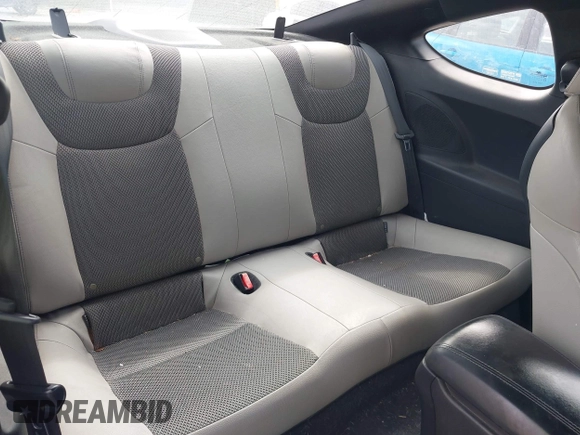 2014 Hyundai Genesis Coupe 2.0T with VIN KMHHT6KD5EU118599, listed as a IAAI auction lot 42242355 with 137,441 mi miles and . Bid and sale history available at DreamBid. Image 8.