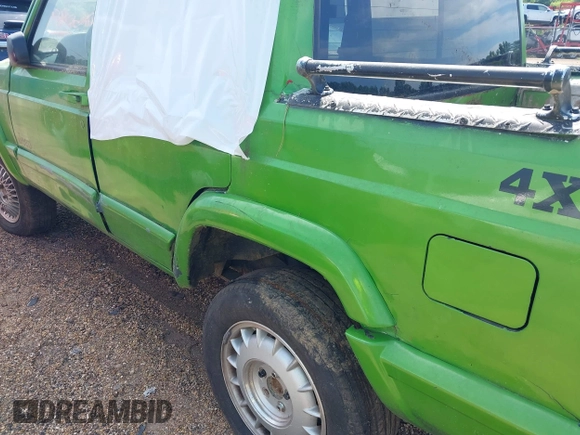 1999 Jeep Cherokee Sport with VIN 1J4FF68S1XL651707, listed as a IAAI auction lot 42325089 with Not provided miles and . Bid and sale history available at DreamBid. Image 13.