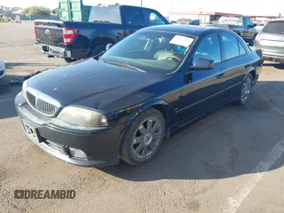 2003 Lincoln LS Sport z VIN 1LNHM87A33Y689084, wystawiony jako IAAI lot #41023405 z przebiegiem 205 200 mil mil oraz . Historia ofert i sprzedaży dostępna na DreamBid. Obrazek 2.
