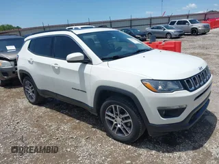 2020 Jeep Compass Latitude with VIN 3C4NJDBB8LT234466, listed as a IAAI auction lot 42458266 with 51,601 mi miles and . Bid and sale history available at DreamBid. Image 1.