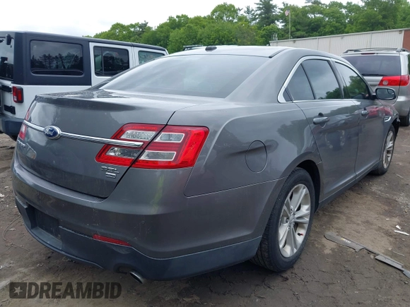 2013 Ford Taurus SEL z VIN 1FAHP2H84DG139362, wystawiony jako IAAI lot #42367272 z przebiegiem 232 500 mil mil oraz . Historia ofert i sprzedaży dostępna na DreamBid. Obrazek 4.