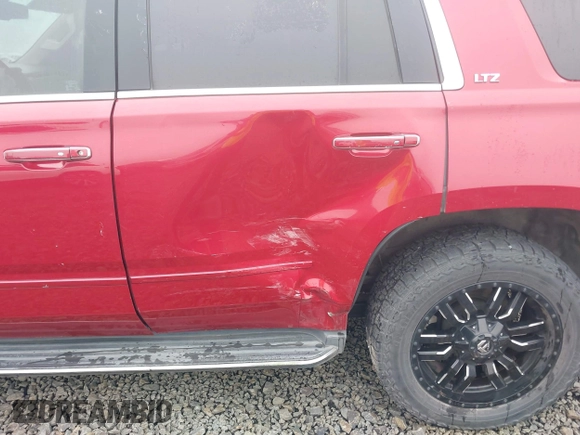 2015 Chevrolet Tahoe LTZ z VIN 1GNSKCKC6FR276531, wystawiony jako IAAI lot #41692617 z przebiegiem 124 010 mil mil oraz . Historia ofert i sprzedaży dostępna na DreamBid. Obrazek 17.