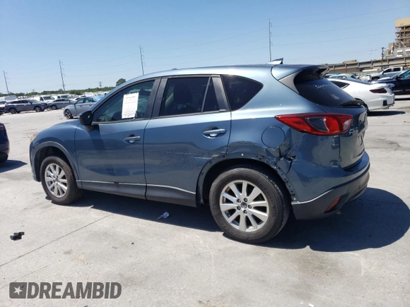 2016 Mazda CX-5 Touring with VIN JM3KE2CY3G0635643, listed as a Copart auction lot 52949105 with 179,464 mi miles and Clean Title. Bid and sale history available at carsss.com. Image 2.