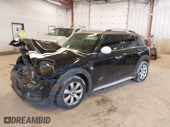 2019 MINI Countryman Cooper with VIN WMZYV5C53K3E05041, listed as a IAAI auction lot 41684566 with 65,237 mi miles. Bid and sale history available at carsss.com. Image 17.