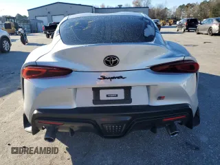 2022 Toyota GR Supra 2.0 with VIN WZ1DB2C08NW046734, listed as a Copart auction lot 83992154 with 43,576 mi miles and Salvage Title. Bid and sale history available at carsss.com. Image 6.