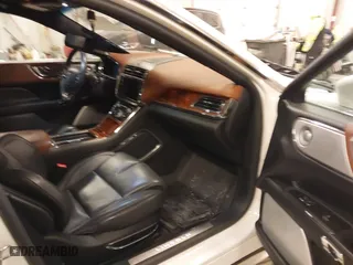 2017 Lincoln Continental Black Label with VIN 1LN6L9BC9H5637539, listed as a IAAI auction lot 41516006 with 163,223 mi miles. Bid and sale history available at carsss.com. Image 5.