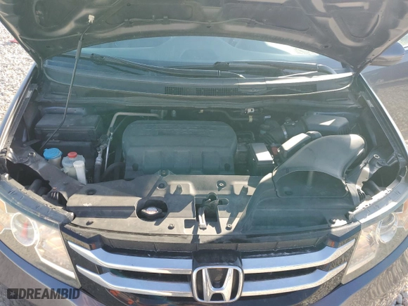 2014 Honda Odyssey EX-L with VIN 5FNRL5H63EB137799, listed as a Copart auction lot 48311285 with 147,596 mi miles and Salvage Title. Bid and sale history available at carsss.com. Image 12.