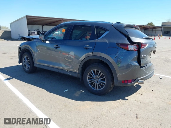 2019 Mazda CX-5 Touring with VIN JM3KFACM1K0533142, listed as a IAAI auction lot 41880181 with Not Provided miles and . Bid and sale history available at carsss.com. Image 3.