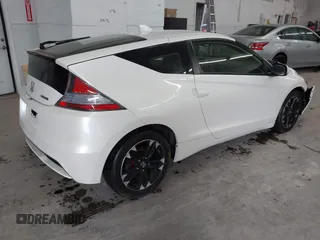 2015 Honda CR-Z EX with VIN JHMZF1D67FS000258, listed as a IAAI auction lot 41838779 with 61,751 mi miles. Bid and sale history available at carsss.com. Image 4.