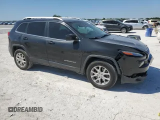 2015 Jeep Cherokee Latitude with VIN 1C4PJMCS6FW558716, listed as a Copart auction lot 50702375 with 133,088 mi miles and Salvage Title. Bid and sale history available at DreamBid. Image 4.