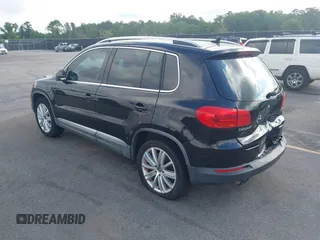 2012 Volkswagen Tiguan SE z VIN WVGAV7AX7CW504391, wystawiony jako IAAI lot #42240604 z przebiegiem 180 330 mil mil oraz . Historia ofert i sprzedaży dostępna na DreamBid. Obrazek 3.