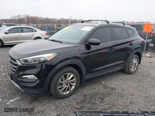 2016 Hyundai Tucson SE with VIN KM8J33A4XGU179953, listed as a IAAI auction lot 41771885 with 103,139 mi miles. Bid and sale history available at carsss.com. Image 2.